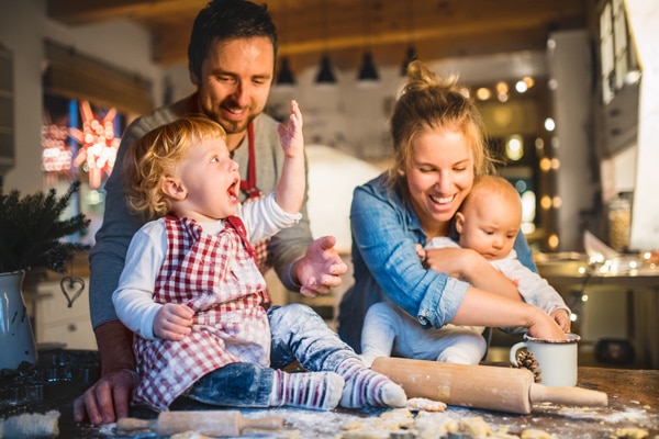 Young family baking in a cozy Texas kitchen.