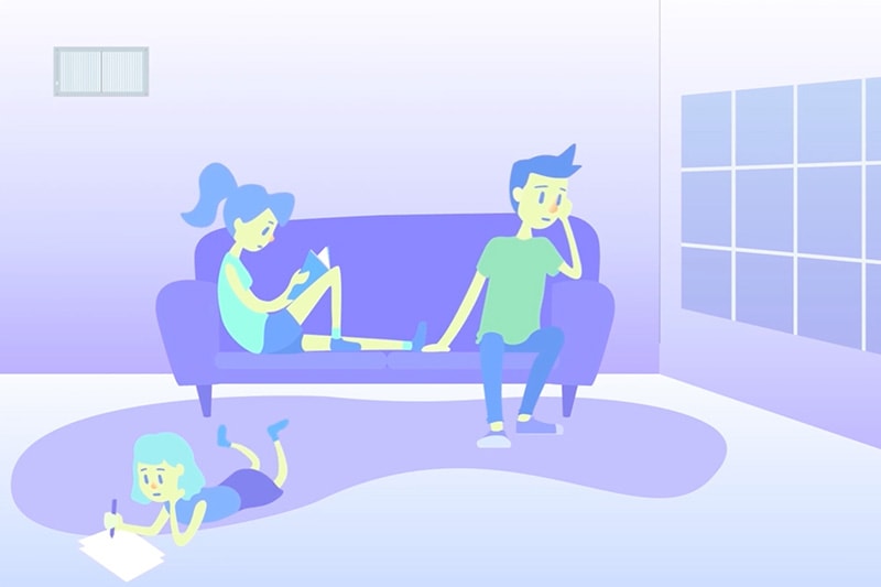 Couple on couch while daughter plays on the floor to represent air quality equipment information.